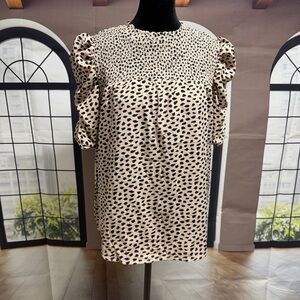 Elegant Cream and Black Patterned Blouse